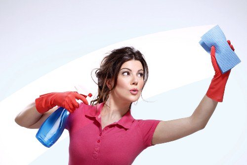 Deep carpet cleaning machine used for steam carpet cleaning in a home